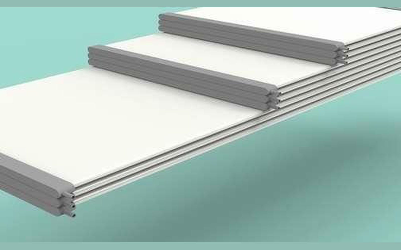 Alumina flat-sheet ceramic plates. Ivory faces, grey end frames with permeate ports.